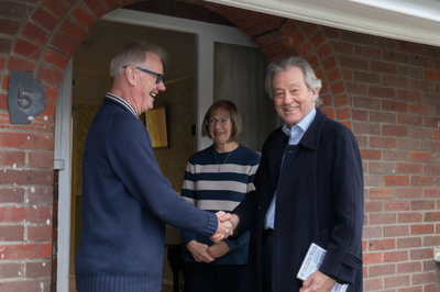 SD canvassing, shaking hands